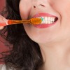 Woman Brushing Teeth