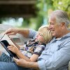 Grandfather Reading to Child
