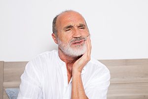 Older Man With Mouth Pain