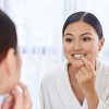 Woman Looking at Her Teeth