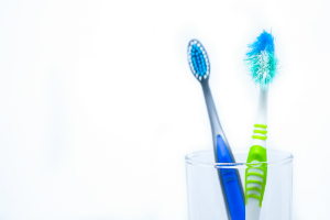 Toothbrushes in a Glass